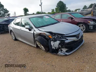 2019 Toyota Camry LE z VIN 4T1B11HK5KU777573, wystawiony jako IAAI lot #42365893 z przebiegiem 76 181 mil mil oraz . Historia ofert i sprzedaży dostępna na DreamBid. Obrazek 1.