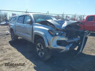 2018 Toyota Tacoma SR with VIN 3TMCZ5AN5JM138271, listed as a IAAI auction lot 41806982 with 95,712 mi miles. Bid and sale history available at carsss.com. Image 1.