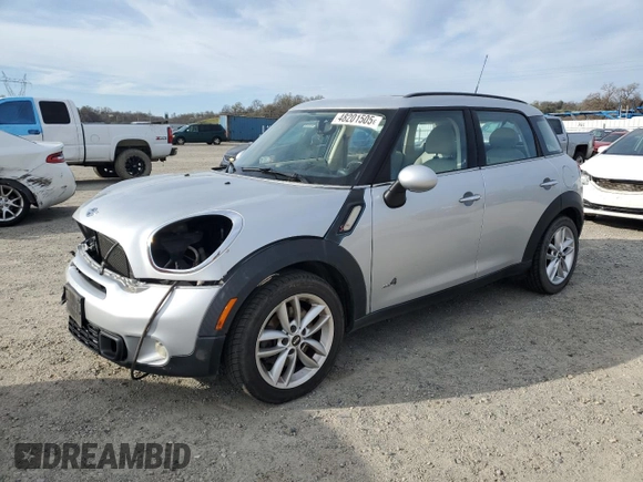 2012 MINI Countryman S with VIN WMWZC5C54CWL59076, listed as a Copart auction lot 48201505 with 172,253 mi miles and Salvage Title. Bid and sale history available at DreamBid. Image 1.