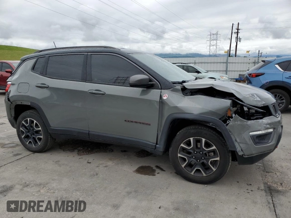2021 Jeep Compass Trailhawk with VIN 3C4NJDDB9MT594344, listed as a Copart auction lot 58821455 with 80,039 mi miles and Salvage title. Bid and sale history available at DreamBid. Image 4.