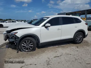 2019 Mazda CX-9 Sport z VIN JM3TCABY9K0334809, wystawiony jako Copart lot #60827115 z przebiegiem 45 996 mil mil oraz Czysty tytuł • Clean title. Historia ofert i sprzedaży dostępna na DreamBid. Obrazek 1.