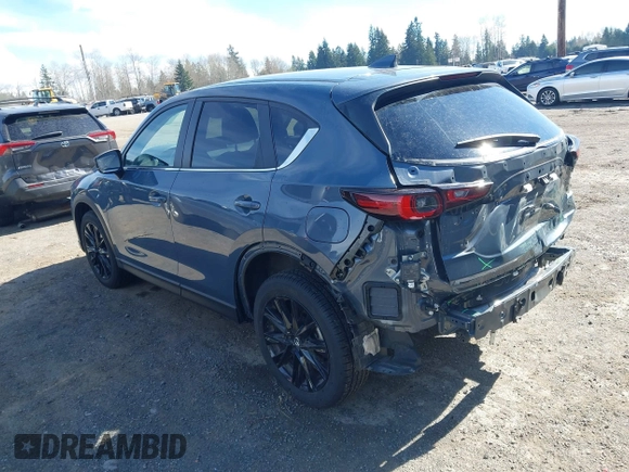 2023 Mazda CX-5 2.5 S Carbon Edition with VIN JM3KFBCM8P0134757, listed as a IAAI auction lot 41893648 with 9,587 mi miles. Bid and sale history available at carsss.com. Image 3.