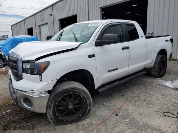 2011 Toyota Tundra 2WD Truck with VIN 5TFRY5F1XBX104891, listed as a Copart auction lot 64767884 with 201,836 mi miles and Salvage Title. Bid and sale history available at carsss.com. Image 1.