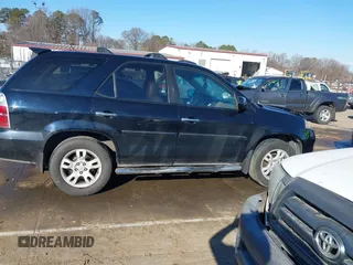 2004 Acura MDX Touring Pkg w/Navigation with VIN 2HNYD18824H501507, listed as a IAAI auction lot 41352086 with 319,002 mi miles. Bid and sale history available at carsss.com. Image 13.