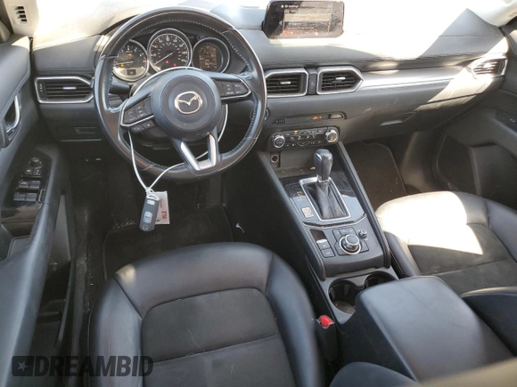 2017 Mazda CX-5 Touring z VIN JM3KFBCL4H0184922, wystawiony jako Copart lot #50166195 z przebiegiem 86 270 mil mil oraz Szkoda całkowita • Salvage title. Historia ofert i sprzedaży dostępna na DreamBid. Obrazek 8.