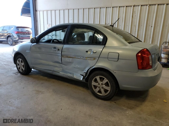 2011 Hyundai Accent GLS with VIN KMHCN4AC1BU615615, listed as a Copart auction lot 52428885 with 122,334 mi miles and Salvage Title. Bid and sale history available at carsss.com. Image 2.
