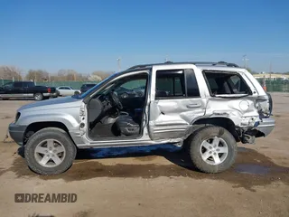 2004 Jeep Grand Cherokee Limited z VIN 1J4GW58S84C269863, wystawiony jako IAAI lot #41900325 z przebiegiem 226 587 mil mil oraz . Historia ofert i sprzedaży dostępna na DreamBid. Obrazek 15.