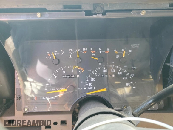 1993 GMC Suburban z VIN 1GKGK26NXPJ711771, wystawiony jako Copart lot #85515174 z przebiegiem 63 064 mil mil oraz Szkoda całkowita • Salvage title. Historia ofert i sprzedaży dostępna na DreamBid. Obrazek 9.