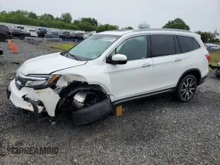 2021 Honda Pilot Elite with VIN 5FNYF6H01MB057789, listed as a Copart auction lot 58543815 with 60,602 mi miles and Salvage title. Bid and sale history available at DreamBid. Image 1.