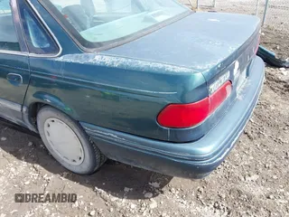 1995 Ford Taurus GL with VIN 1FALP52U2SA113070, listed as a IAAI auction lot 41869576 with 16,935 mi miles and . Bid and sale history available at DreamBid. Image 17.