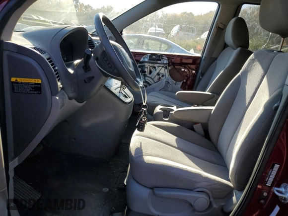 2012 Kia Sedona LX with VIN KNDMG4C77C6503605, listed as a Copart auction lot 77481894 with 103,026 mi miles and Salvage Title. Bid and sale history available at carsss.com. Image 7.