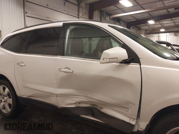 2016 Chevrolet Traverse LTZ with VIN 1GNKVJKD5GJ103247, listed as a IAAI auction lot 42041275 with 106,961 mi miles and . Bid and sale history available at DreamBid. Image 13.