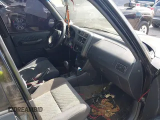 1998 Toyota RAV4 with VIN JT3GP10V7W7037711, listed as a IAAI auction lot 42081313 with 233,554 mi miles and . Bid and sale history available at DreamBid. Image 5.