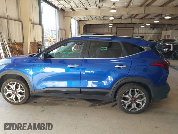 2021 Kia Seltos SX with VIN KNDETCA28M7154385, listed as a IAAI auction lot 41533749 with 34,973 mi miles. Bid and sale history available at carsss.com. Image 14.