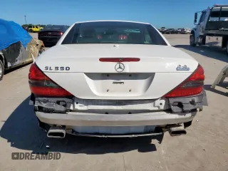 2009 Mercedes-Benz SL 550 with VIN WDBSK71F69F147589, listed as a Copart auction lot 65976995 with 77,387 mi miles and Salvage title. Bid and sale history available at DreamBid. Image 6.