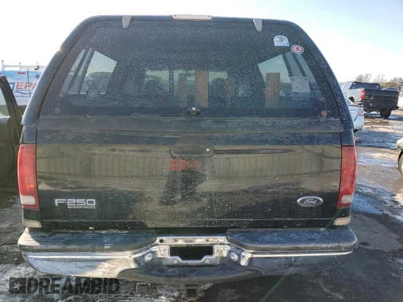 1999 Ford F-250 XL with VIN 1FTNX21L7XED97757, listed as a Copart auction lot 42296985 with 168,728 mi miles and Salvage title. Bid and sale history available at DreamBid. Image 6.