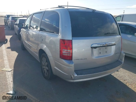 2010 Chrysler Town & Country Touring with VIN 2A4RR5D10AR241247, listed as a IAAI auction lot 41767320 with 130,260 mi miles. Bid and sale history available at carsss.com. Image 3.
