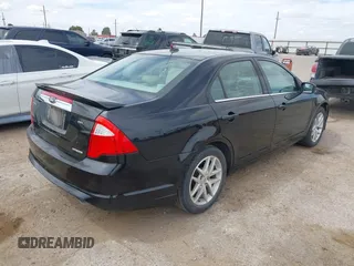2011 Ford Fusion SEL with VIN 3FAHP0JG9BR279516, listed as a IAAI auction lot 41895984 with 184,718 mi miles. Bid and sale history available at carsss.com. Image 4.