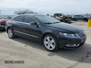 2014 Volkswagen CC Sport with VIN WVWBN7AN7EE521448, listed as a Copart auction lot 46329685 with 169,955 mi miles and Salvage Title. Bid and sale history available at carsss.com. Image 4.