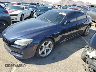 2013 BMW 6 Series 650i xDrive z VIN WBA6B4C56DDG67852, wystawiony jako Copart lot #59168435 z przebiegiem 122 153 mil mil oraz Czysty tytuł • Clean title. Historia ofert i sprzedaży dostępna na DreamBid. Obrazek 1.