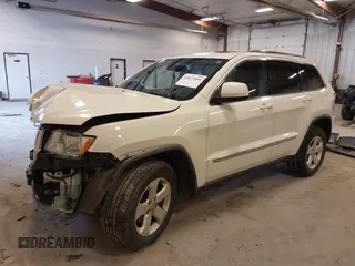 2011 Jeep Grand Cherokee 70th Anniversary with VIN 1J4RR4GG4BC702759, listed as a IAAI auction lot 41871604 with 143,583 mi miles. Bid and sale history available at carsss.com. Image 17.