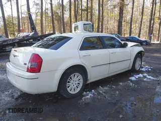 2009 Chrysler 300 Touring with VIN 2C3KA53V99H621745, listed as a IAAI auction lot 41604655 with 115,004 mi miles. Bid and sale history available at carsss.com. Image 4.
