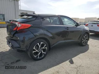 2018 Toyota C-HR XLE z VIN NMTKHMBXXJR024077, wystawiony jako Copart lot #53398025 z przebiegiem 97 079 mil mil oraz Szkoda całkowita • Salvage title. Historia ofert i sprzedaży dostępna na DreamBid. Obrazek 3.