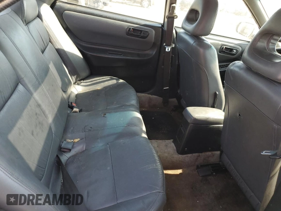 1999 Acura Integra z VIN JH4DB7668XS005069, wystawiony jako Copart lot #61384394 z przebiegiem 207 353 mil mil oraz Szkoda całkowita • Salvage title. Historia ofert i sprzedaży dostępna na DreamBid. Obrazek 10.