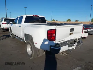 2018 Chevrolet Silverado 3500HD High Country with VIN 1GC4K1EY6JF207068, listed as a IAAI auction lot 41288394 with 110,158 mi miles and . Bid and sale history available at DreamBid. Image 15.