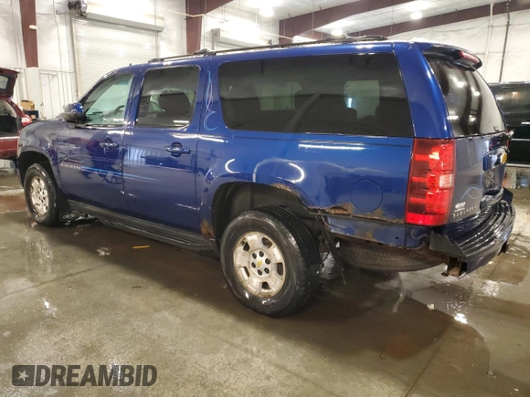 2012 Chevrolet Suburban LS with VIN 1GNSKHE78CR231923, listed as a Copart auction lot 82618924 with 234,418 mi miles and Salvage Title. Bid and sale history available at carsss.com. Image 2.