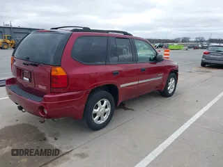 2006 GMC Envoy SLE with VIN 1GKDT13S262175296, listed as a IAAI auction lot 41866248 with 249,830 mi miles. Bid and sale history available at carsss.com. Image 4.