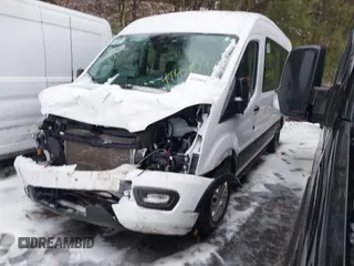 2022 Ford Transit Passenger XL with VIN 1FBAX2C88NKA79625, listed as a IAAI auction lot 41490410 with 27,521 mi miles and . Bid and sale history available at DreamBid. Image 2.