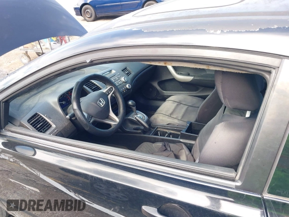 2009 Honda Civic EX with VIN 2HGFG12899H518424, listed as a IAAI auction lot 42019765 with 214,577 mi miles and . Bid and sale history available at DreamBid. Image 13.