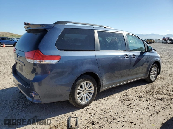 2014 Toyota Sienna XLE with VIN 5TDYK3DC5ES467244, listed as a Copart auction lot 54777445 with 157,503 mi miles and Salvage Title. Bid and sale history available at DreamBid. Image 3.