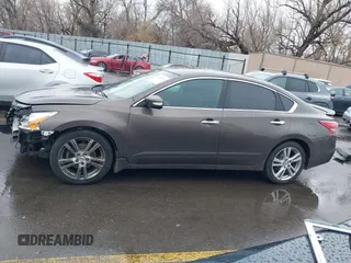 2013 Nissan Altima SV with VIN 1N4BL3AP4DC922343, listed as a IAAI auction lot 41746608 with 185,240 mi miles and . Bid and sale history available at DreamBid. Image 14.