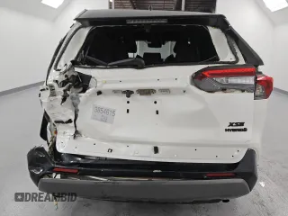 2021 Toyota RAV4 Hybrid XSE with VIN 4T3E6RFV8MU060122, listed as a Copart auction lot 62019045 with 60,971 mi miles and Salvage title. Bid and sale history available at DreamBid. Image 6.