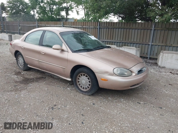 1996 Mercury Sable LS z VIN 1MELM53S1TG638988, wystawiony jako IAAI lot #42523616 z przebiegiem 87 087 mil mil oraz . Historia ofert i sprzedaży dostępna na DreamBid. Obrazek 1.
