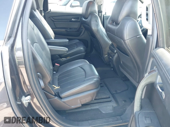 2016 Chevrolet Traverse LTZ z VIN 1GNKRJKD1GJ301277, wystawiony jako IAAI lot #41884629 z przebiegiem 106 338 mil mil oraz . Historia ofert i sprzedaży dostępna na DreamBid. Obrazek 8.