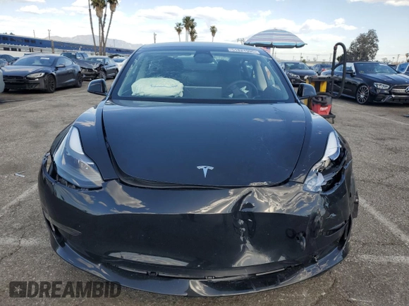 2023 Tesla Model 3 z VIN 5YJ3E1EA3PF713735, wystawiony jako Copart lot #51821995 z przebiegiem Nie podano mil oraz Szkoda całkowita • Salvage title. Historia ofert i sprzedaży dostępna na DreamBid. Obrazek 5.