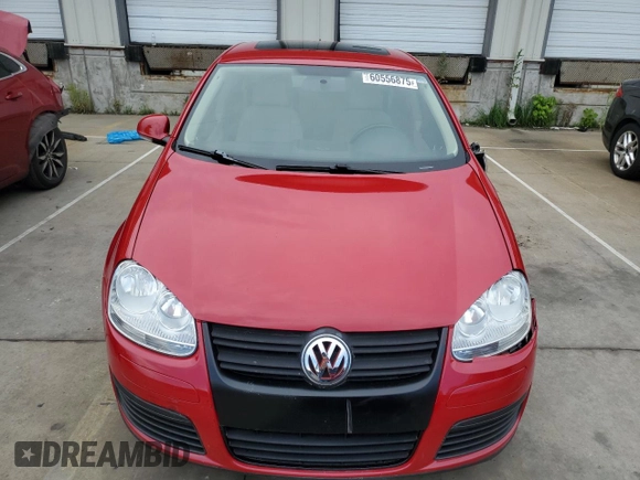 2010 Volkswagen Jetta Wolfsburg Edition with VIN 3VWRJ7AJXAM154666, listed as a Copart auction lot 60556875 with 149,509 mi miles and Salvage title. Bid and sale history available at DreamBid. Image 5.