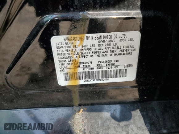 2014 Infiniti Q50 Hybrid Premium with VIN JN1AV7AP2EM692078, listed as a Copart auction lot 86895944 with 123,940 mi miles and Salvage title. Bid and sale history available at DreamBid. Image 12.