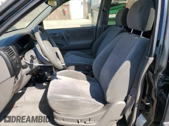 2003 Isuzu Rodeo with VIN 4S2CK58W634313617, listed as a Copart auction lot 70144664 with 179,921 mi miles and Clean Title. Bid and sale history available at DreamBid. Image 7.