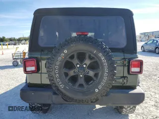 2020 Jeep Wrangler Willys with VIN 1C4GJXAG8LW285550, listed as a Copart auction lot 41337045 with 24,388 mi miles and Salvage title. Bid and sale history available at DreamBid. Image 6.
