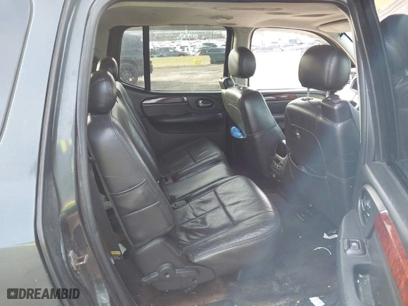 2005 GMC Envoy XL SLT with VIN 1GKET16M156142931, listed as a IAAI auction lot 41584914 with 215,452 mi miles. Bid and sale history available at carsss.com. Image 8.