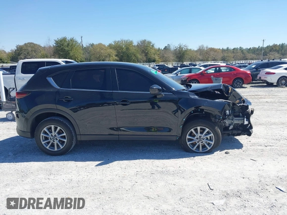 2023 Mazda CX-5 2.5 S with VIN JM3KFBAM3P0244974, listed as a IAAI auction lot 41748896 with 21,387 mi miles. Bid and sale history available at carsss.com. Image 13.