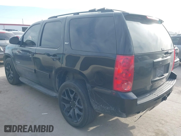 2012 GMC Yukon SLT with VIN 1GKS2CE06CR150096, listed as a IAAI auction lot 41703820 with 308,958 mi miles. Bid and sale history available at carsss.com. Image 3.