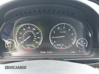 2014 BMW 5 Series 528i with VIN WBA5A5C52ED503033, listed as a IAAI auction lot 41562997 with 127,564 mi miles. Bid and sale history available at carsss.com. Image 7.
