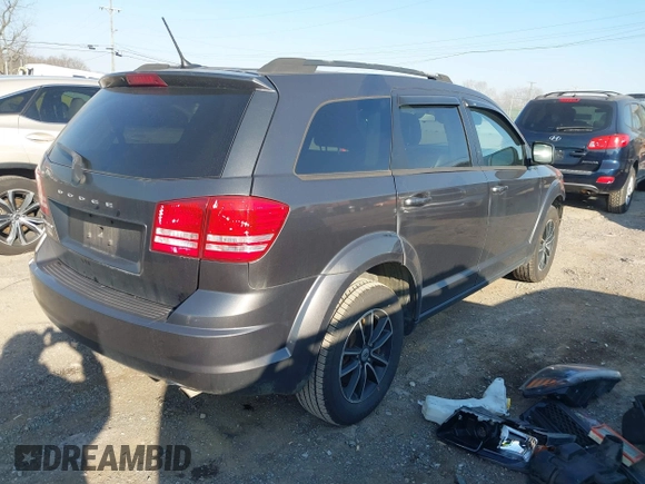 2018 Dodge Journey SE with VIN 3C4PDCAB4JT295807, listed as a IAAI auction lot 41743064 with 105,836 mi miles and . Bid and sale history available at DreamBid. Image 4.