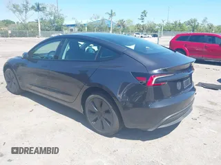 2025 Tesla Model 3 Long Range with VIN 5YJ3E1EA5SF902847, listed as a IAAI auction lot 41776081 with 2,461 mi miles and . Bid and sale history available at carsss.com. Image 3.