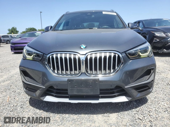 2020 BMW X1 xDrive28i с VIN WBXJG9C06L5R54942, выставлен на аукционе Copart как лот 54262435 с пробегом 65 217 миль миль и Списание • Salvage title. История ставок и продаж доступна на DreamBid. Изображение 5.